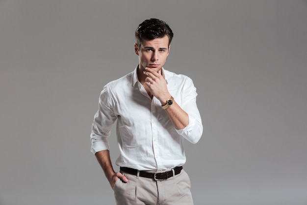 Free photo portrait of a handsome smiling dressed in white shirt