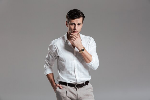 Portrait of a handsome smiling dressed in white shirt