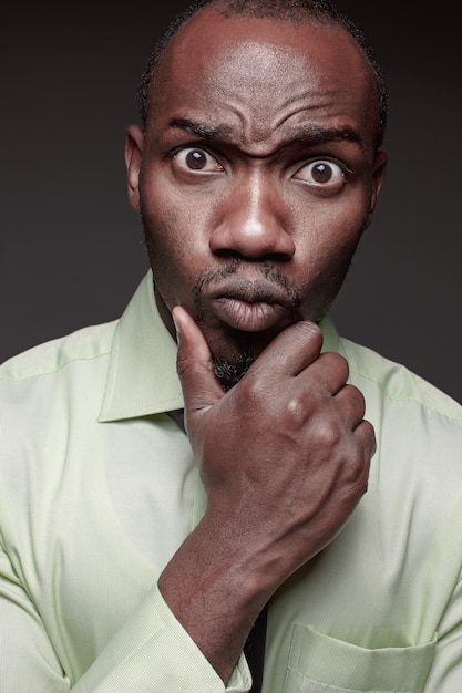 Portrait of handsome young black african man