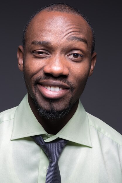 Portrait of handsome young black african smiling man