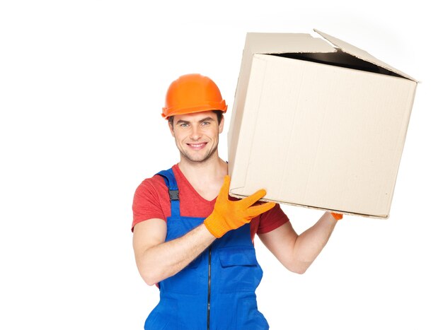 Portrait of handsome young delivery man with paper boxes isolated on white