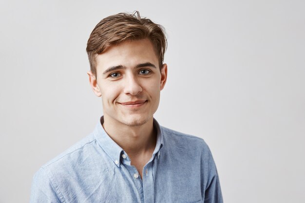 Portrait of handsome young man posing