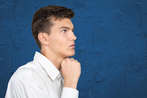 Portrait of handsome young thoughtful man