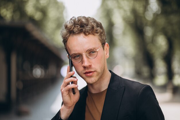 Portrait of a hansome man talking on the phone