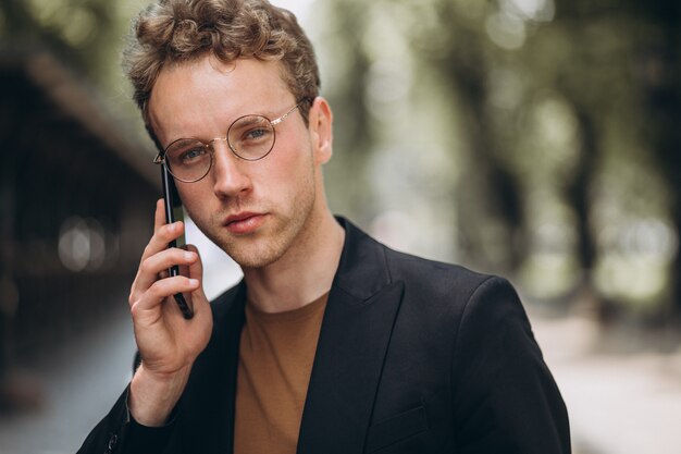 Portrait of a hansome man talking on the phone