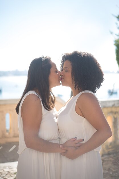 Portrait of happy brides