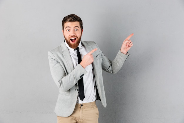 Portrait of a happy businessman dressed in suit