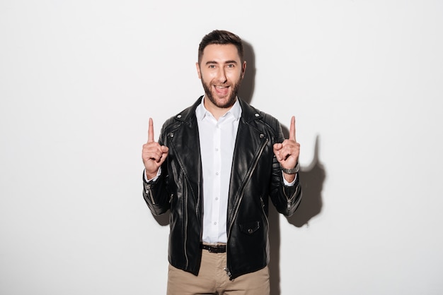 Portrait of a happy cheerful man dressed in jacket