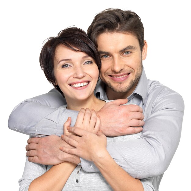 Portrait of happy couple . Attractive man and woman being playful.