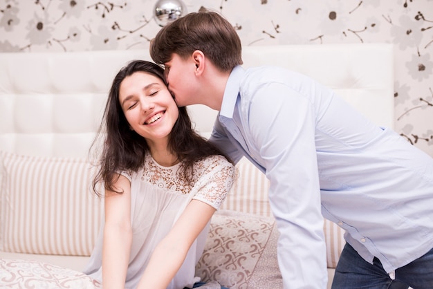 Free photo portrait of happy couple at home