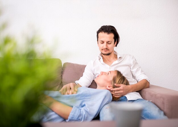 Portrait of happy couple at home