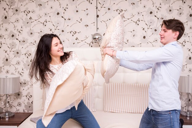 Portrait of happy couple at home