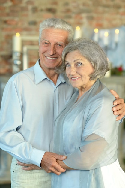 Portrait of a happy elderly couple embracing