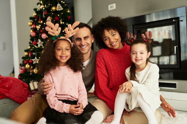 Portrait of happy family celebrating Christmas