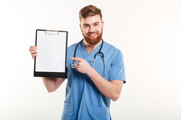 Portrait of happy friendly young medical doctor or a nurse