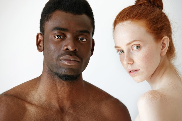 Portrait of happy loving interracial couple