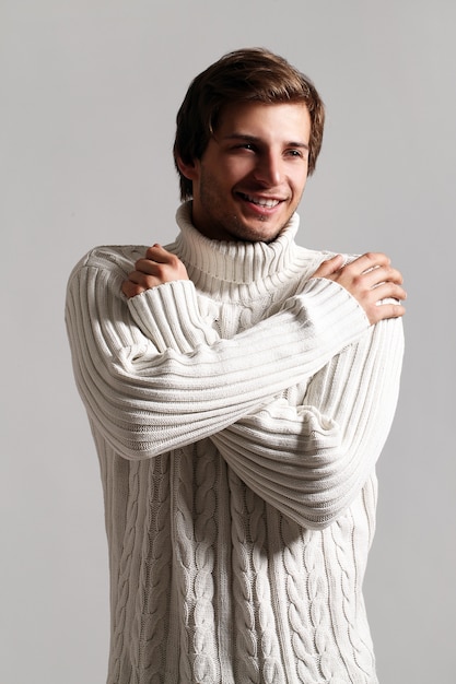 Portrait of happy man wearing winter clothes