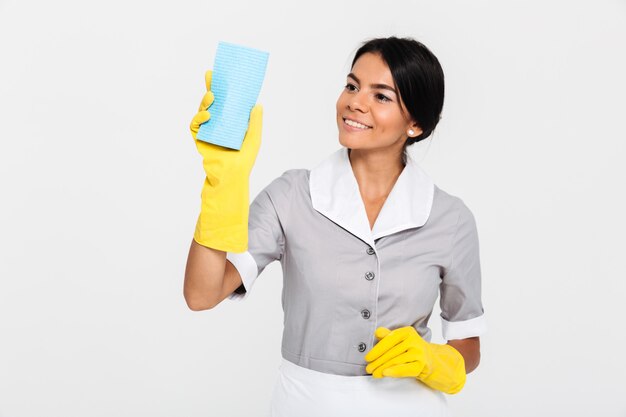 Portrait of a happy pretty housekeeper