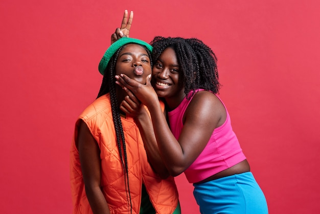 Portrait of happy romantic lesbian couple posing together