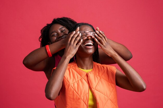 Portrait of happy romantic lesbian couple posing together