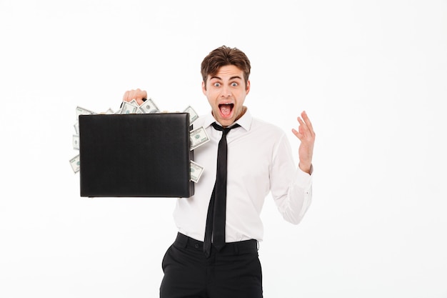 Free photo portrait of a happy satisfied businessman