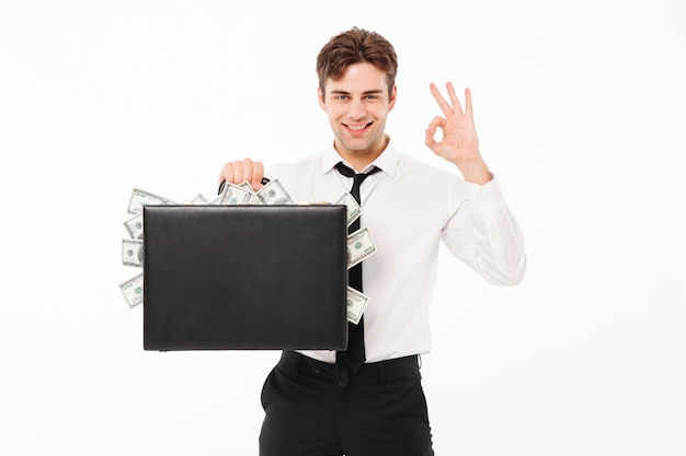 Free photo portrait of a happy satisfied businessman