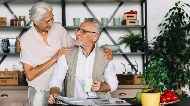 Portrait of happy senior couple looking at each other