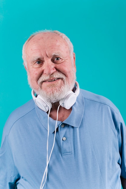 Portrait happy senior  with headphones