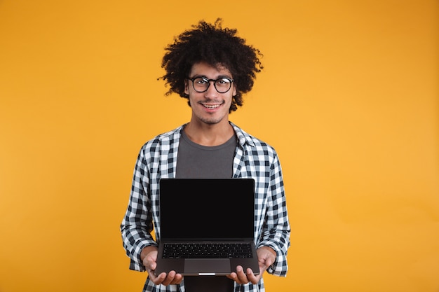 Portrait of a happy smart african man in eyeglasses