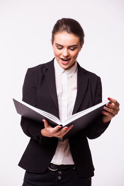 Portrait of happy smiling business woman with black folder, isolated on white wall