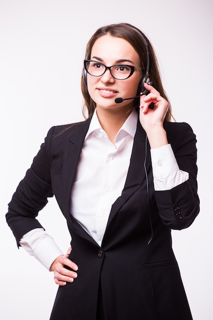 Portrait of happy smiling cheerful support phone operator in headset, isolated on white wall