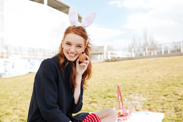 Portrait of a happy smiling woman with long ginger hair