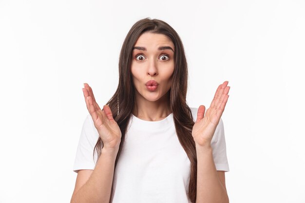 Portrait of happy surprised young woman glad hear friend getting promoted