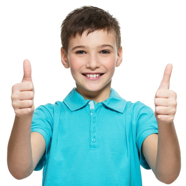 Portrait of happy teen boy showing thumbs up gesture