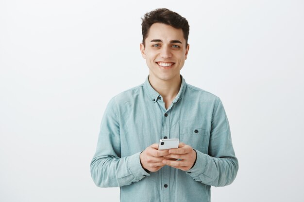 Portrait of happy thankful european man in shirt