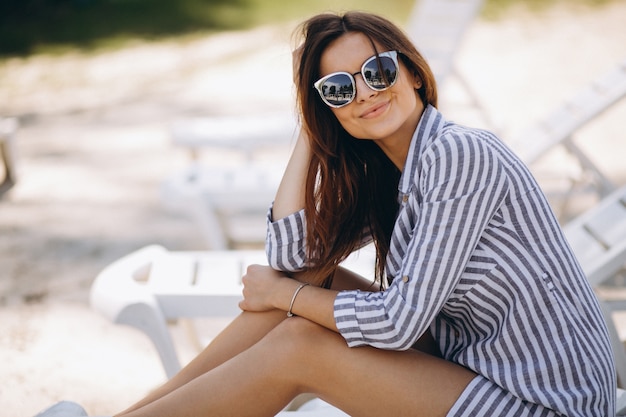 Portrait of a happy woman at the beach