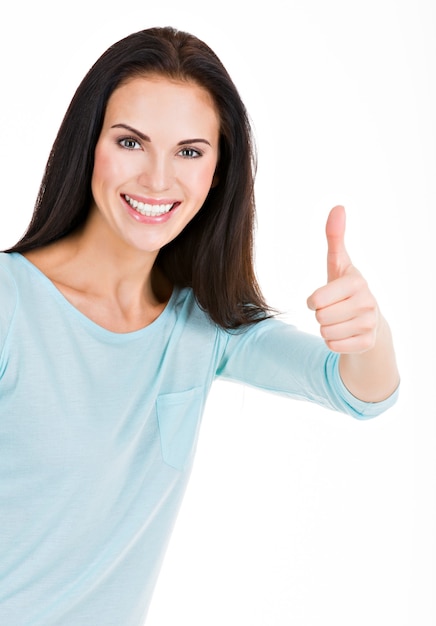 Free photo portrait of happy woman with thumbs up isolated on white