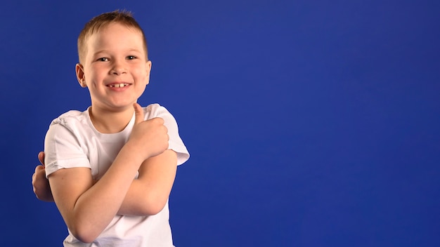 Portrait of happy young boy with copy space