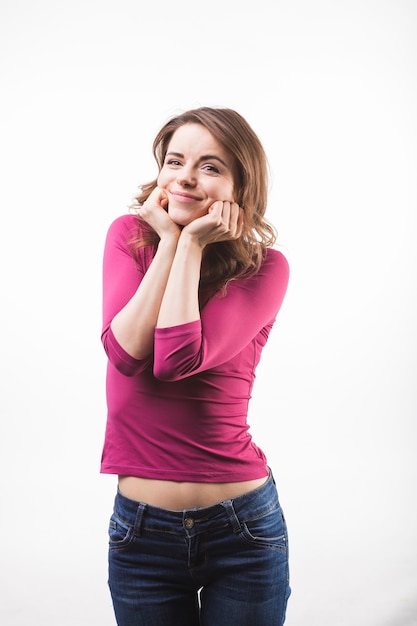 Portrait of happy young woman isolated over white background