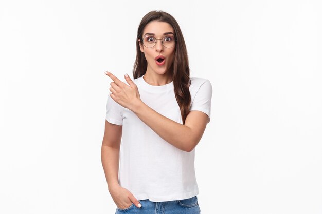 Portrait of impressed and enthusiastic, thrilled brunette female