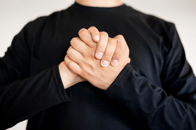 Free photo portrait of interpreter teaching sign language