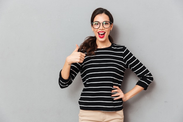 Portrait of a joyful woman in eyeglasses