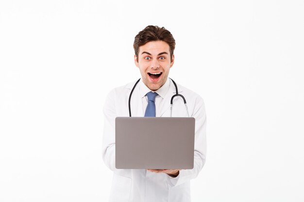 Portrait of a joyful young male doctor