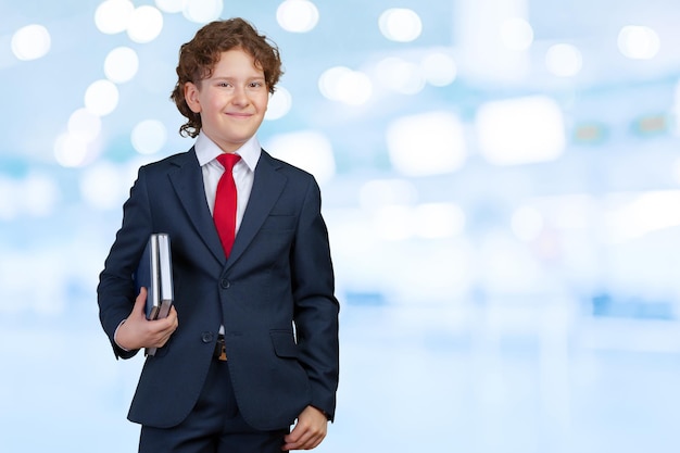 Free photo portrait of a kid businessman