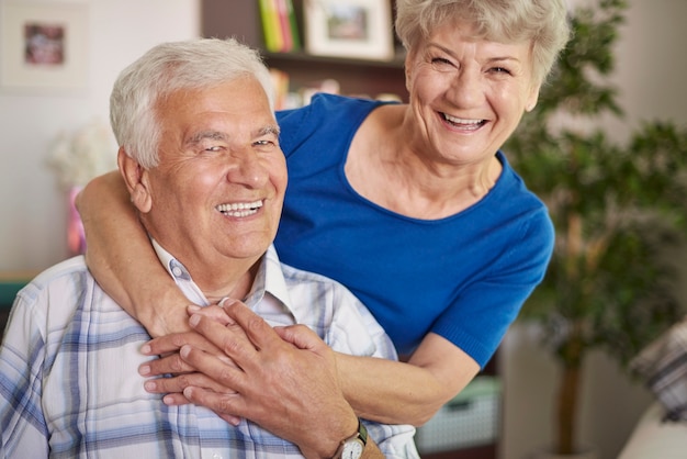 Free photo portrait of laughing senior marriage