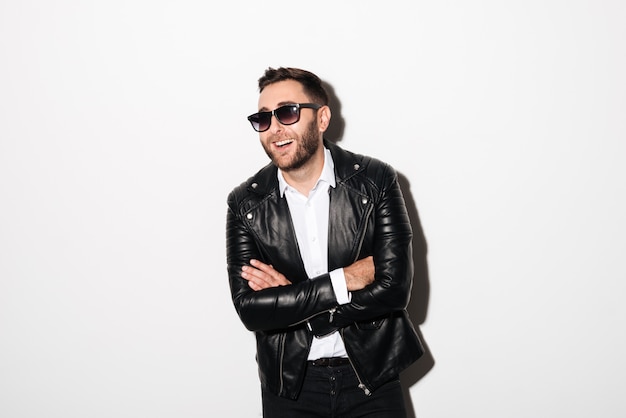 Portrait of a laughing young man in sunglasses