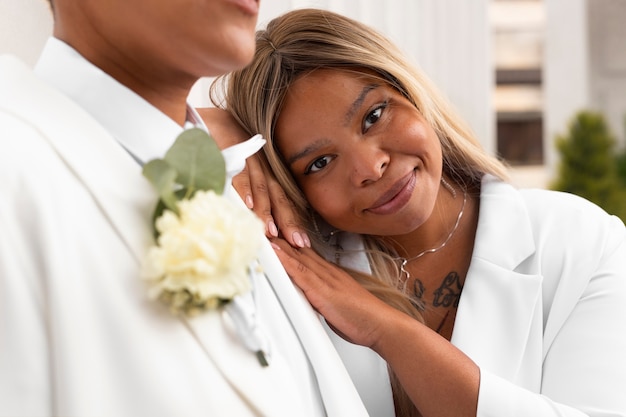 Free photo portrait of lesbian women during their wedding ceremony