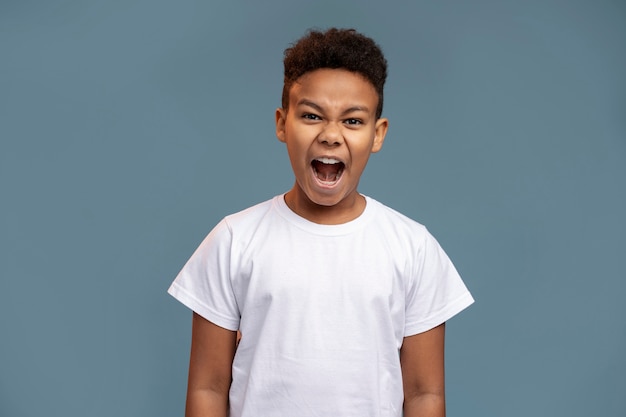 Free photo portrait of little angry boy