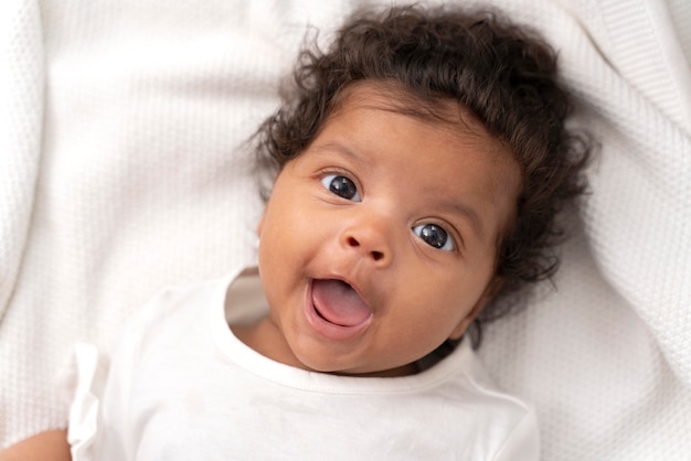 Portrait of little baby girl smiling