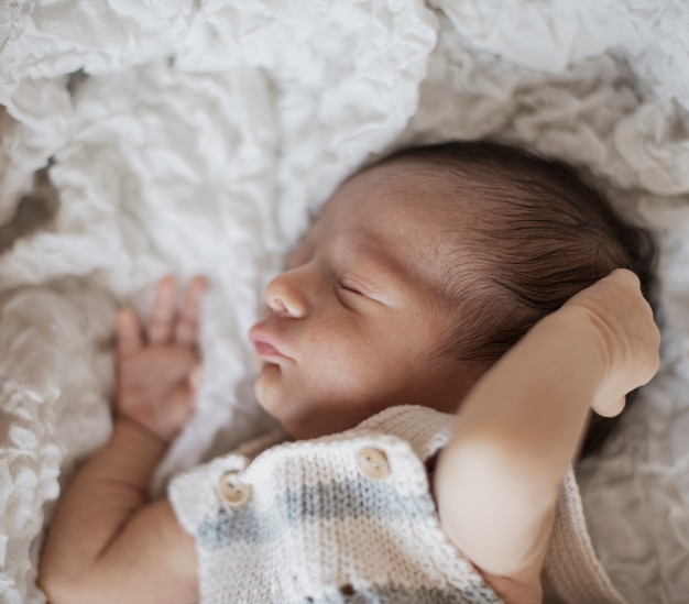 Portrait of little baby taking a nap